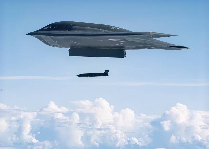 A photo of a B-2 deploying an AGM-158C anti-ship missile.