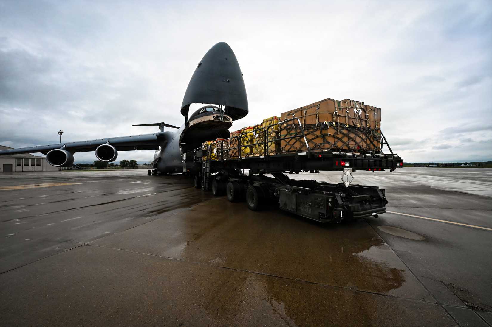 A photo of a C-5 Galaxy being loaded with 50 metric tons of seized narcotics valued at $5 billion, which were marked for destruction.
