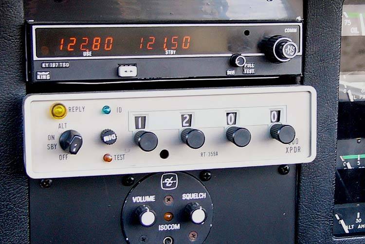 Cessna ARC RT-359A transponder and Bendix/King KY197 VHF communication radio mounted in the instrument panel of a 1970 model American Aviation AA-1 Yankee aircraft.