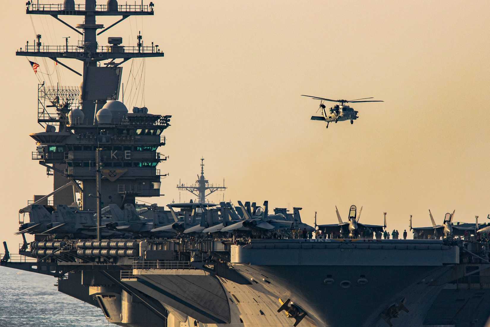 Dwight D. Eisenhower Carrier Strike Group and French Navy frigate FS Languedoc in the Strait of Hormuz
