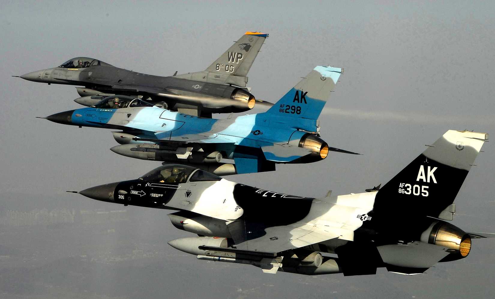 Three US Air Force F-16 Fighting Falcon Block 30 aircraft from the 80th Fighter Squadron fly in formation over South Korea during a training mission, Jan. 9, 2008. 