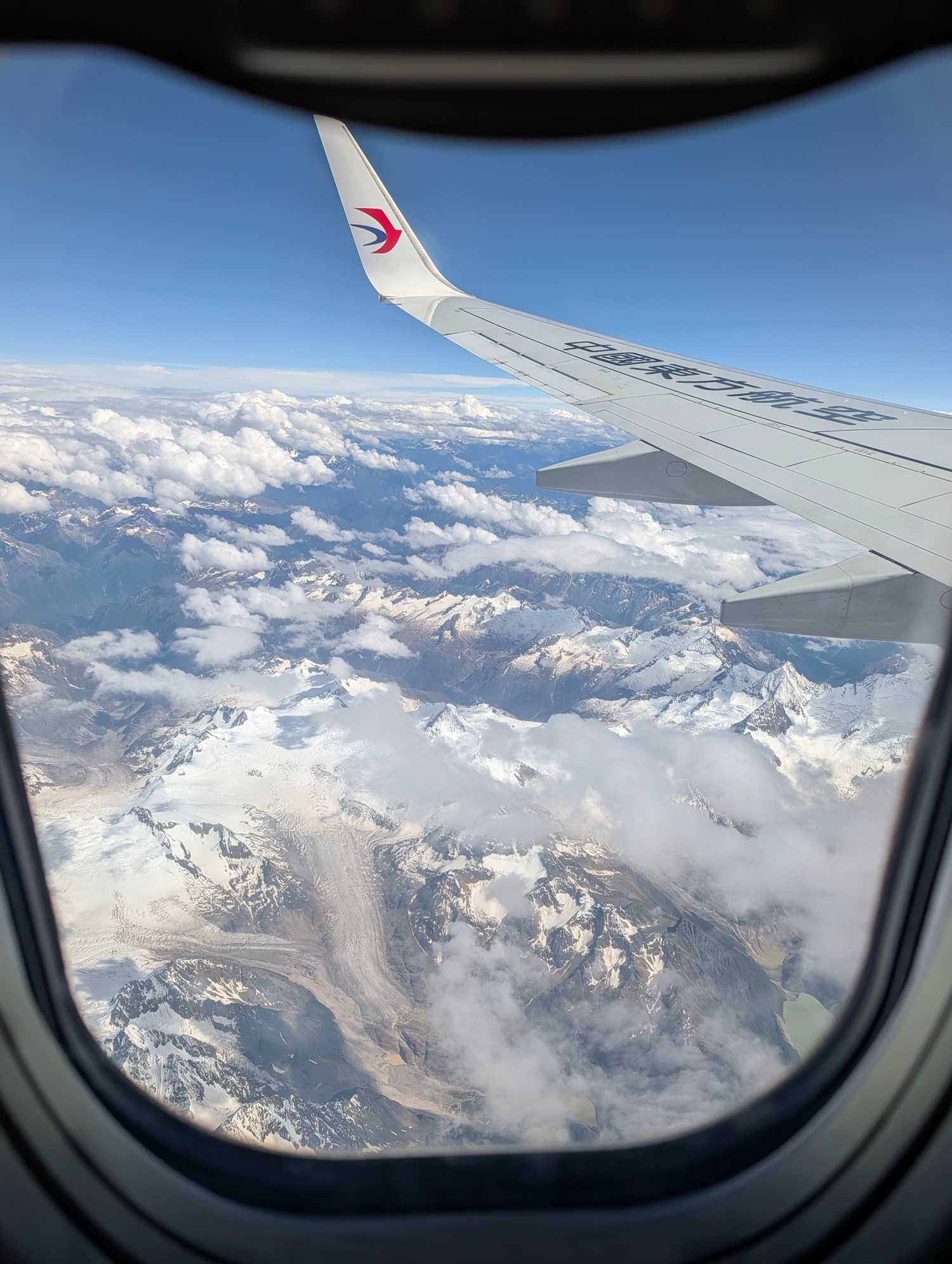 Flying over Tibetan mountains