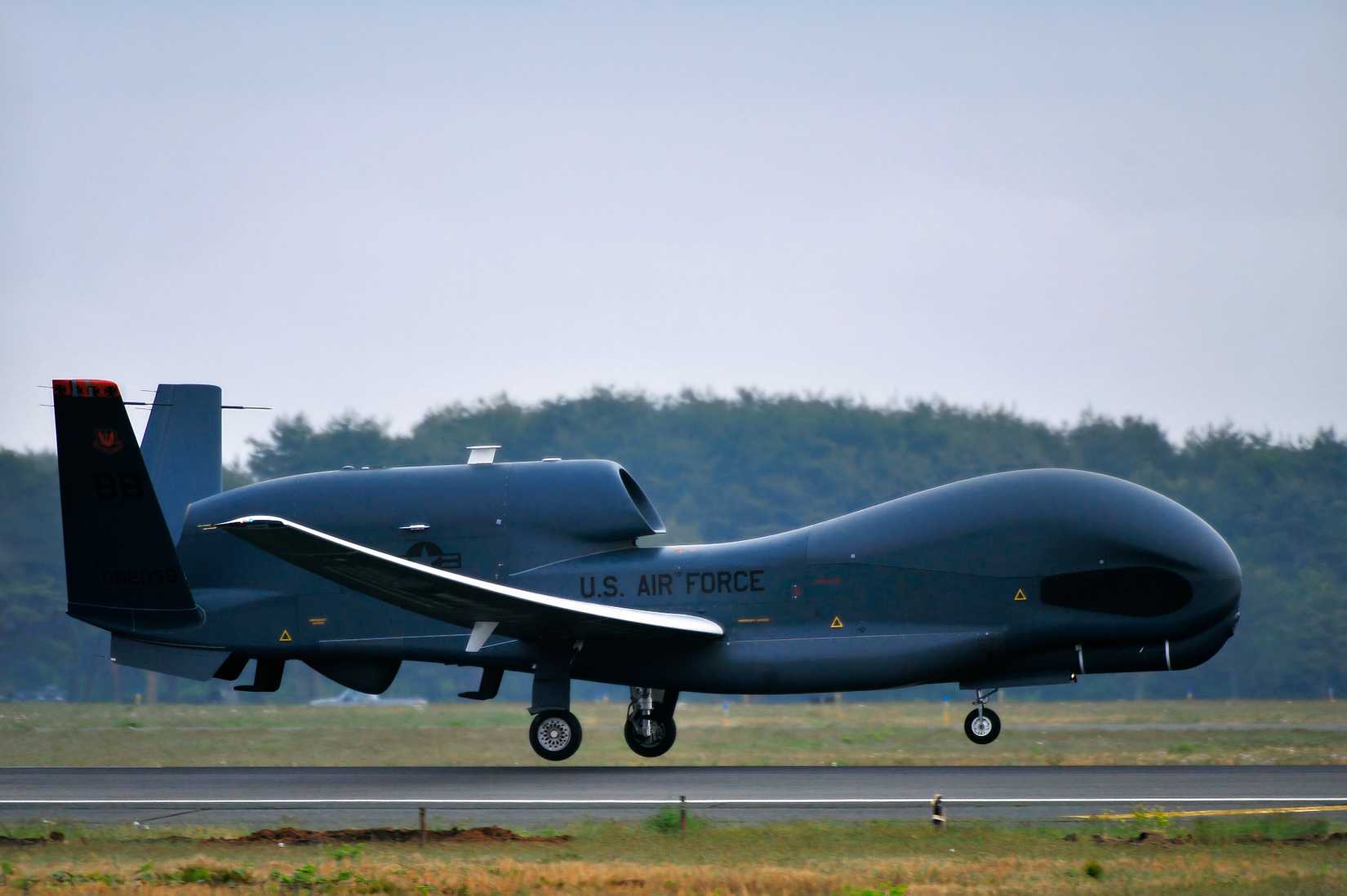 A sideview photo of a Global Hawk mere moments after taking off.