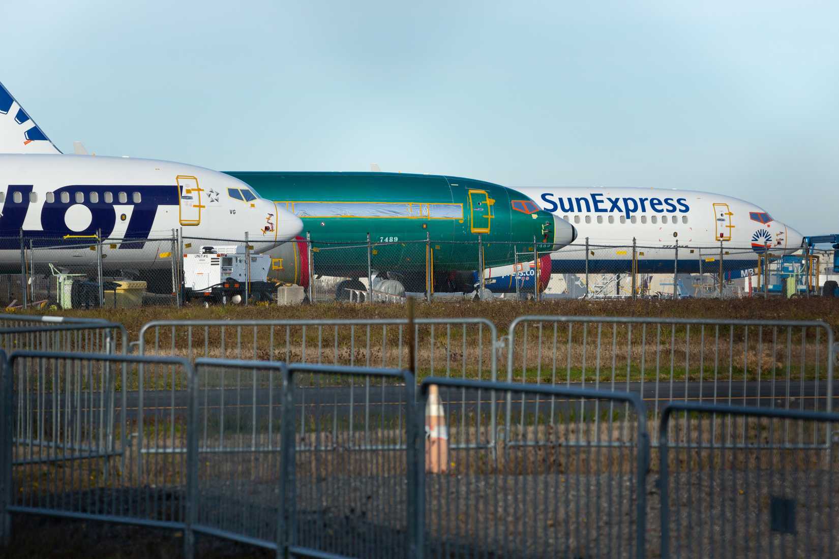 Grounded 737-Max jetliners parked on the tarmac at the Boeing factory