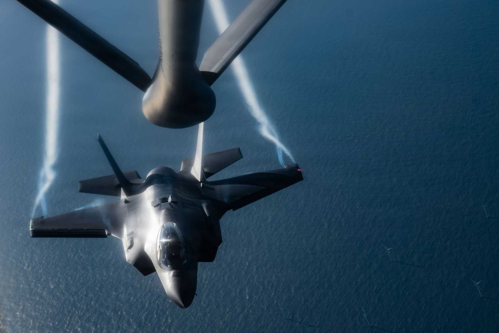 ir Force F-35A Lightning II assigned to the 48th Fighter Wing, Royal Air Force Lakenheath, approaches a KC-135 Stratotanker assigned to the 100th Air Refueling Wing, RAF Mildenhall