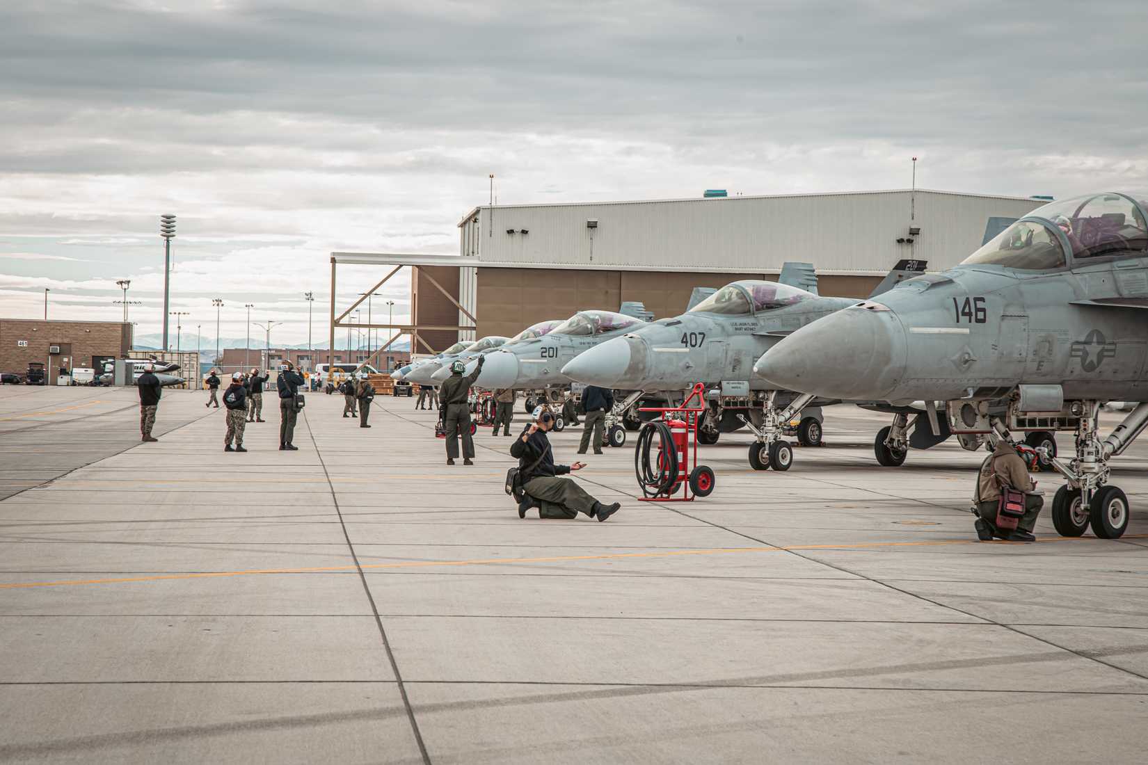 Naval Aviators & Aircrew at the Naval Aviation Warfighting Development Center (NAWDC) conduct flight operations at Naval Air Station Fallon