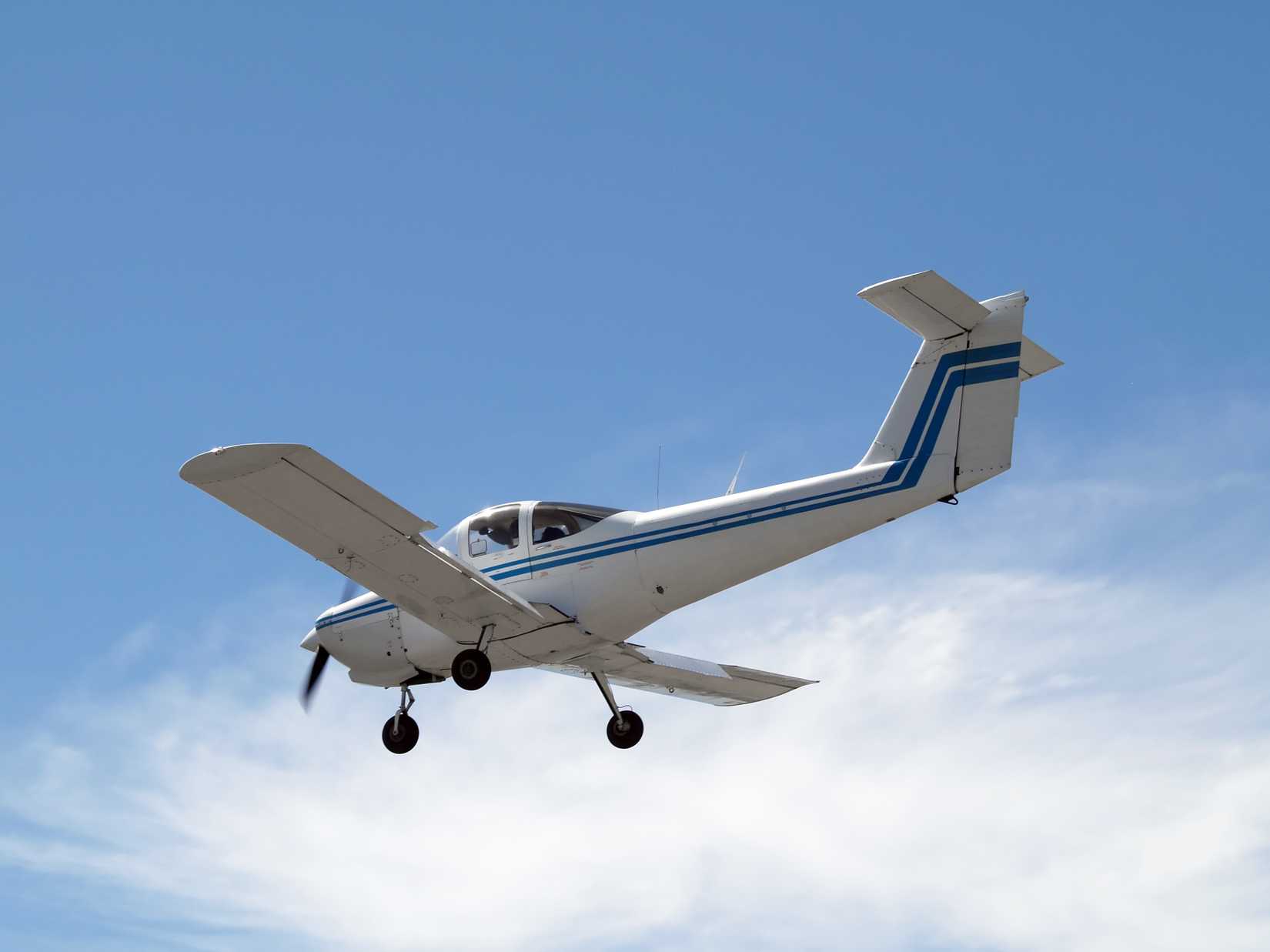 Piper Tomahawk flying in blue sky