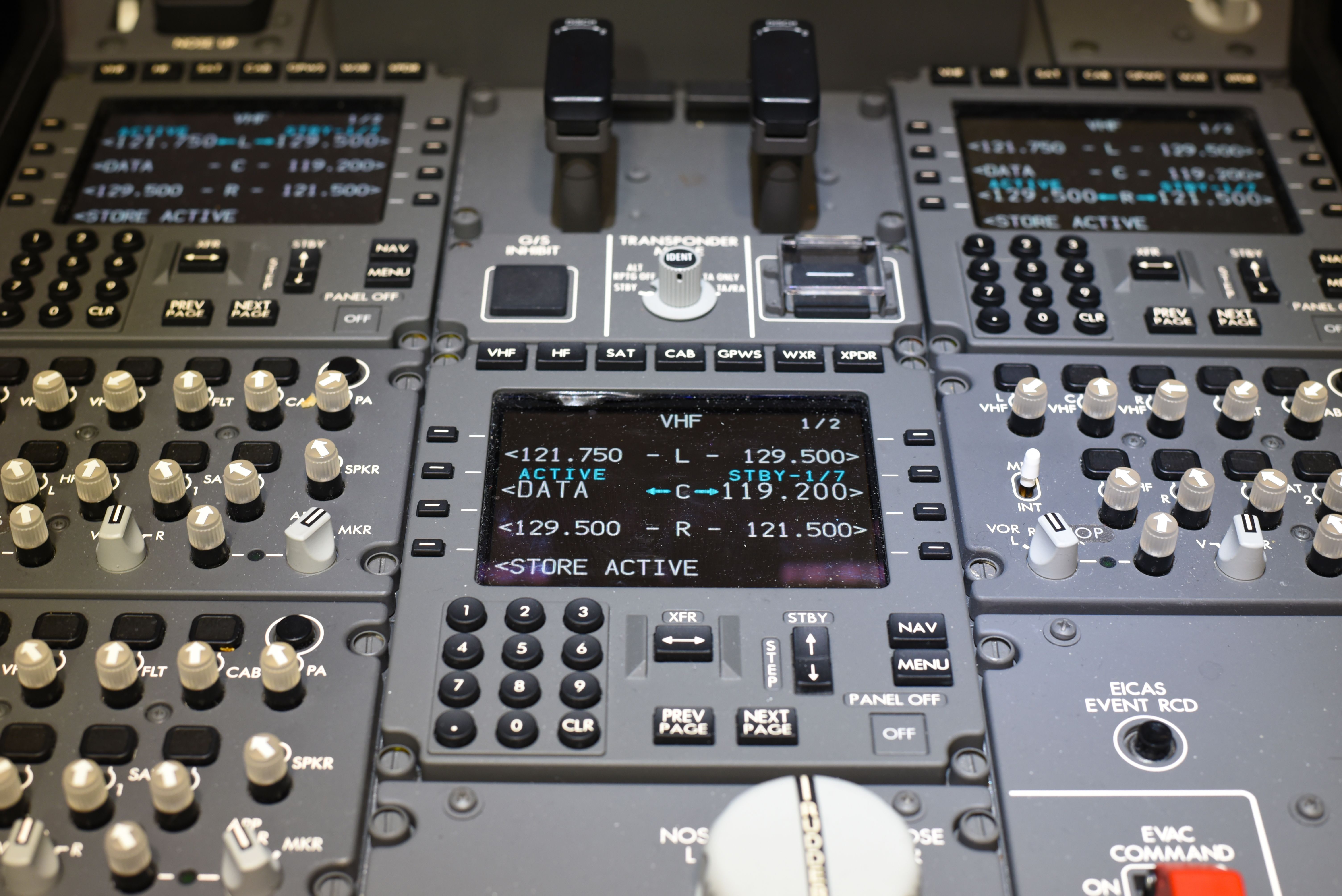 Close up of a center pedestal in the cockpit. Flight instruments.