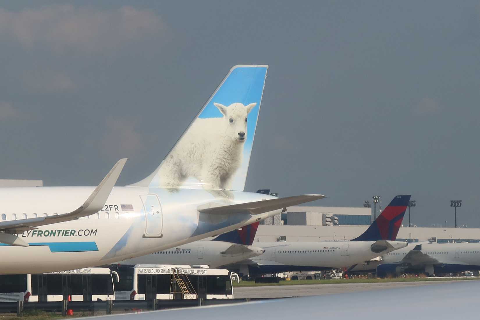 Frontier Airlines and Delta Air Lines at Hartsfield-Jackson Atlanta International Airport in USA. August 21, 2023