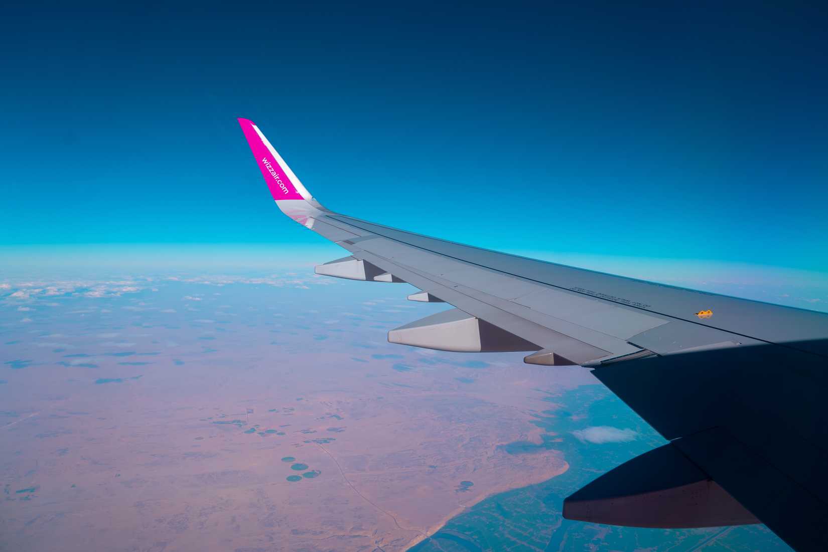 Jeddah, Saudi Arabia - February 15 2024:Wizz air airplane wing.