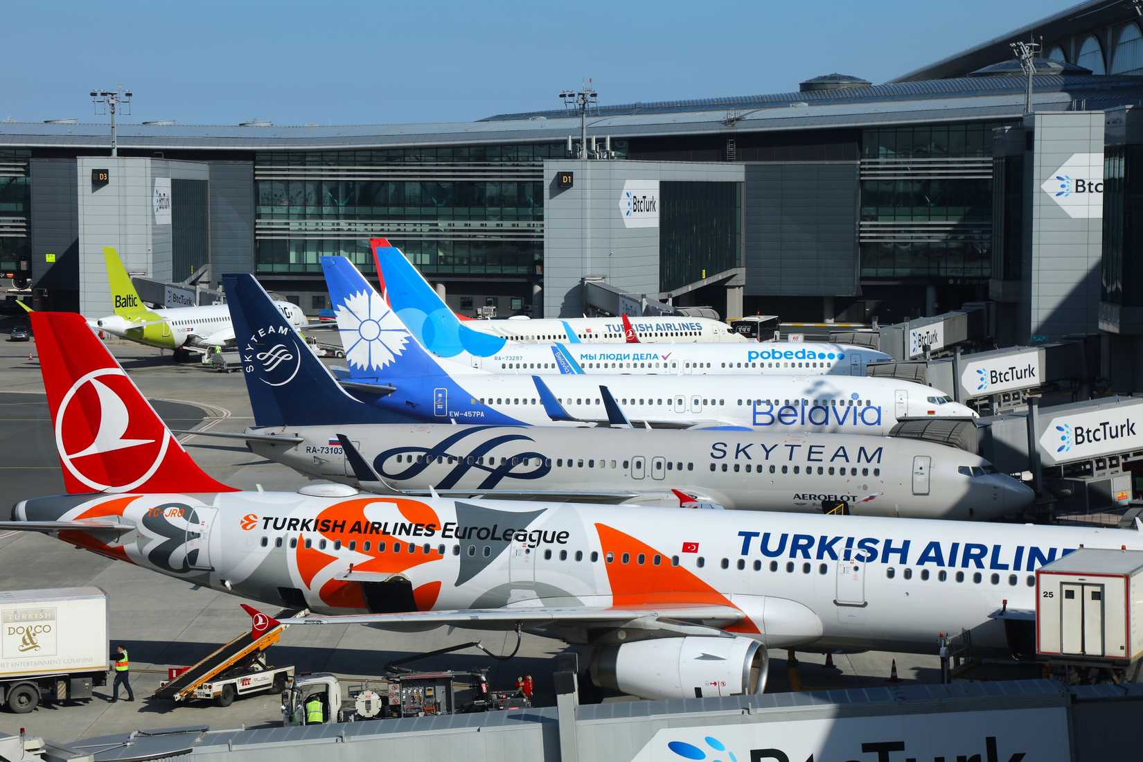 Turkish Airlines, Aeroflot, Belavia and Pobeda airlines aircraft parked at Istanbul International Airport