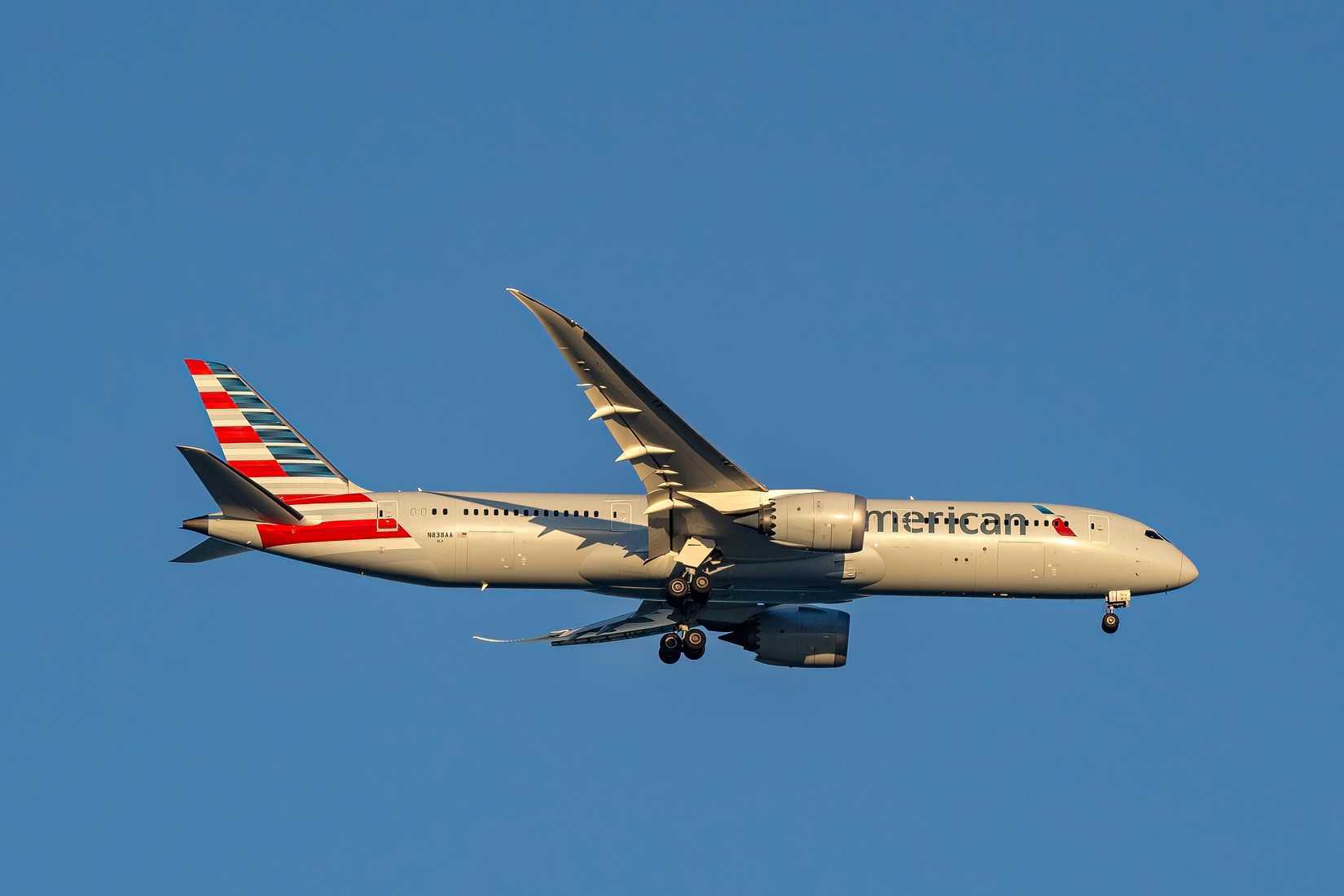 Doha, Qatar - December 20, 2024: American Airlines Boeing 787-9 Dreamliner airplane at Hamad International Airport Doha Qatar
