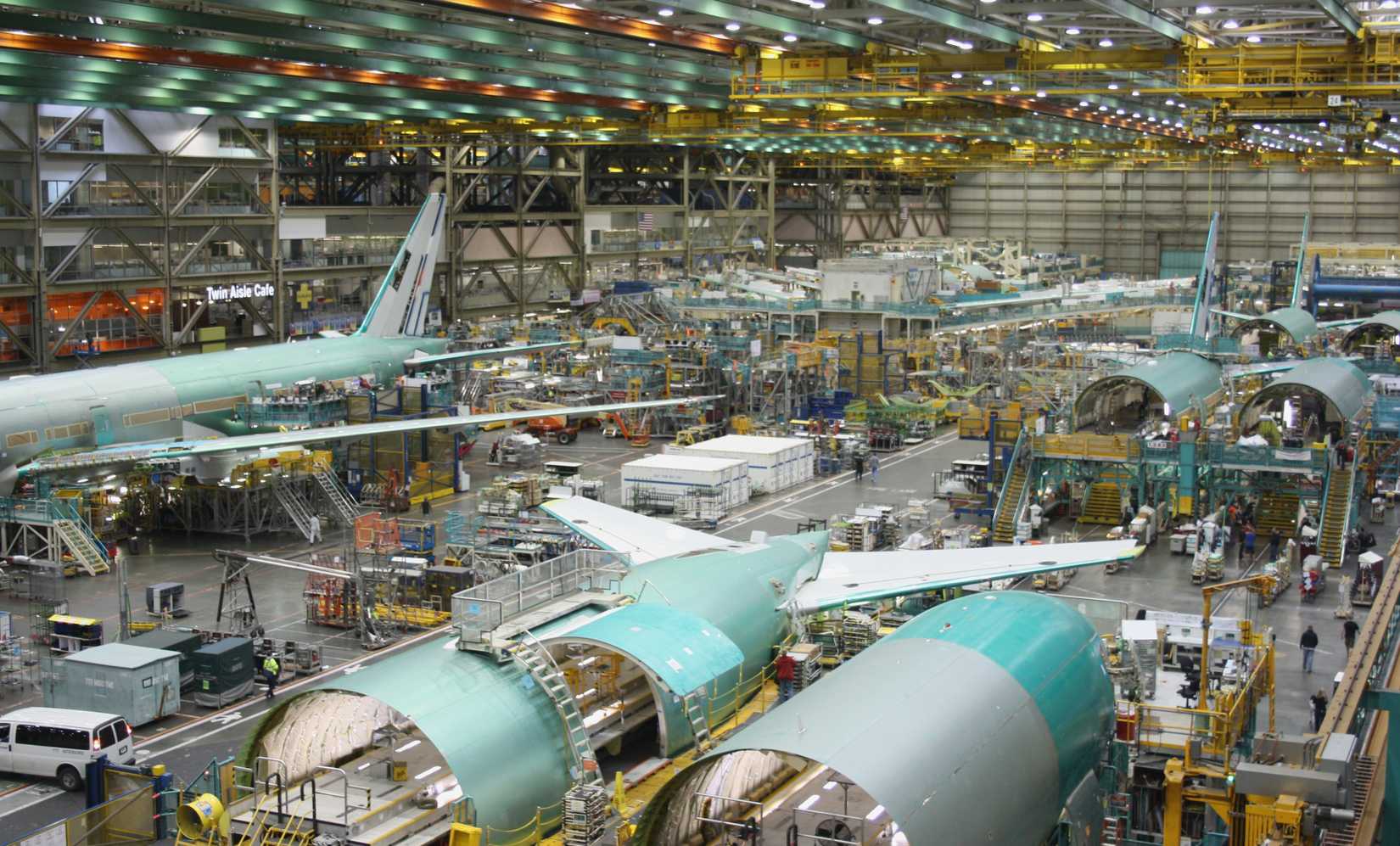 EVERETT (WA), USA – JANUARY 30 2015: Unidentified Boeing employees continue work building its latest Boeing 777 jets at its Everett factory.