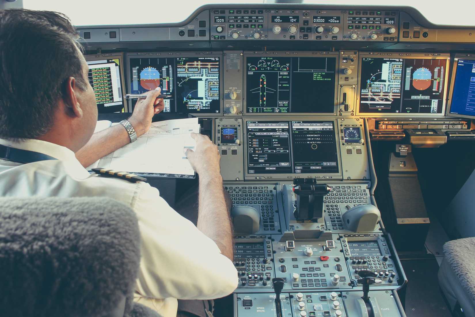 A flight deck (cockpit) of the first delivered Airbus A350-900 (9M-MAB) of Malaysia Airlines (Oneworld) as seen from the rear. Flight operated to Bangkok from KUL as MH782