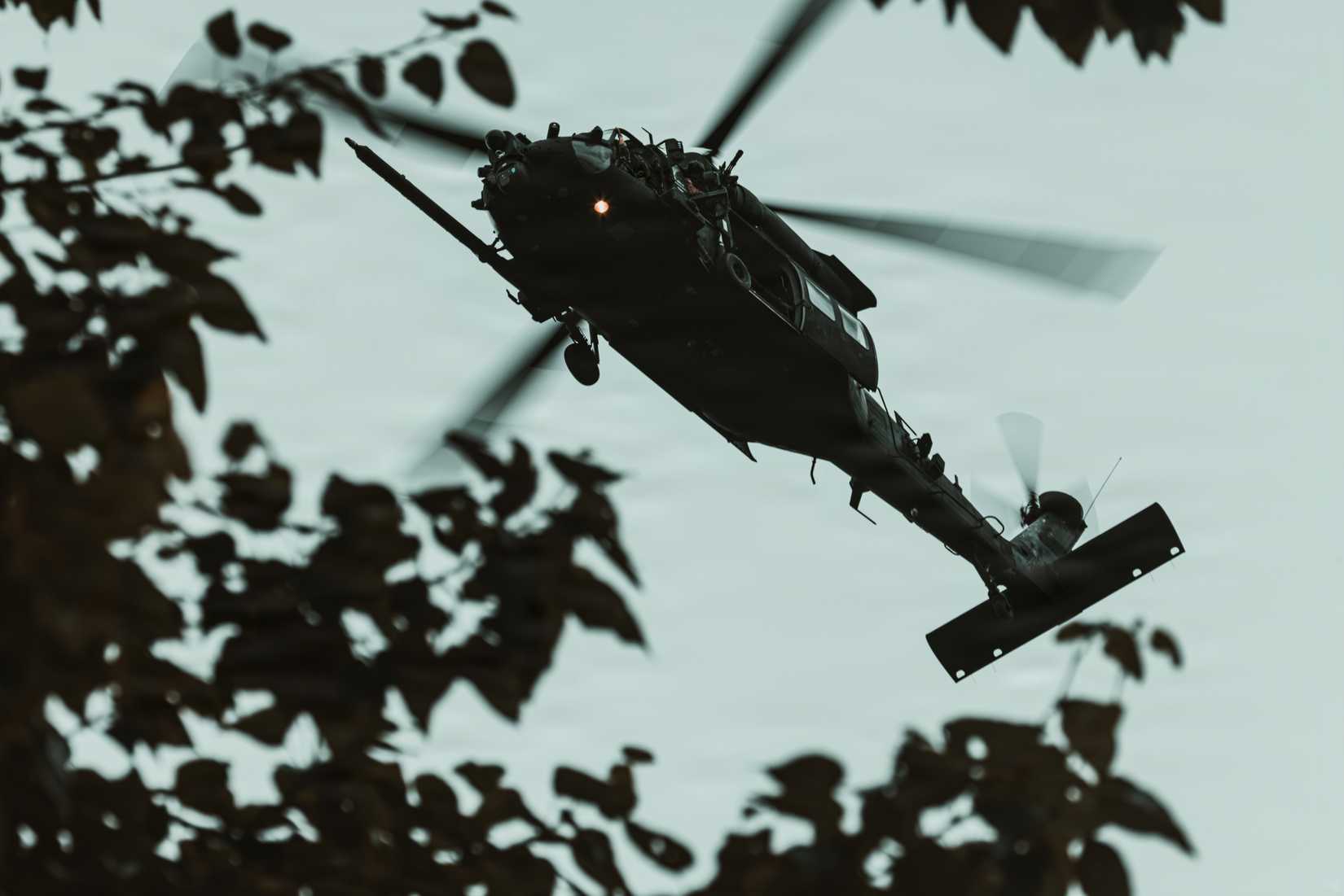 Soldiers assigned to 160th Special Operations Aviation Regiment, approach a designated pick up zone in a UH-60 Black Hawk