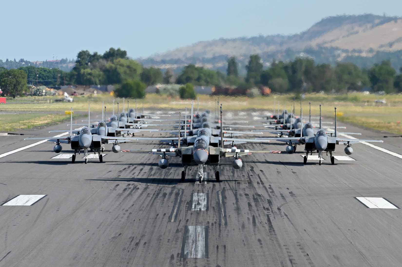 The 173rd Fighter Wing conducted an elephant walk, lining up 16 F-15CD Eagle aircraft down its runway, July 14, 2025
