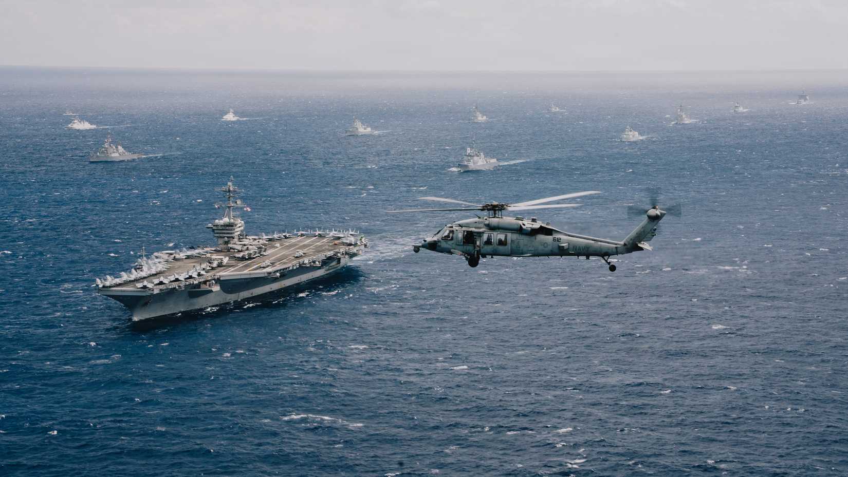 The Nimitz-class aircraft carrier USS Theodore Roosevelt (CVN 71) leads a group sail July 22, 2026, in the Pacific Ocean off the coast of Hawaii