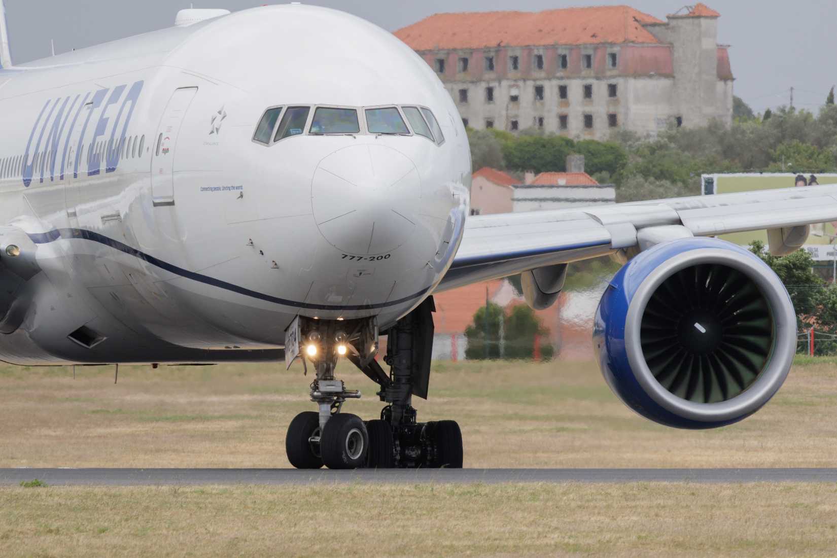 United airlines boeing 777 aircraft taxiing on the runway