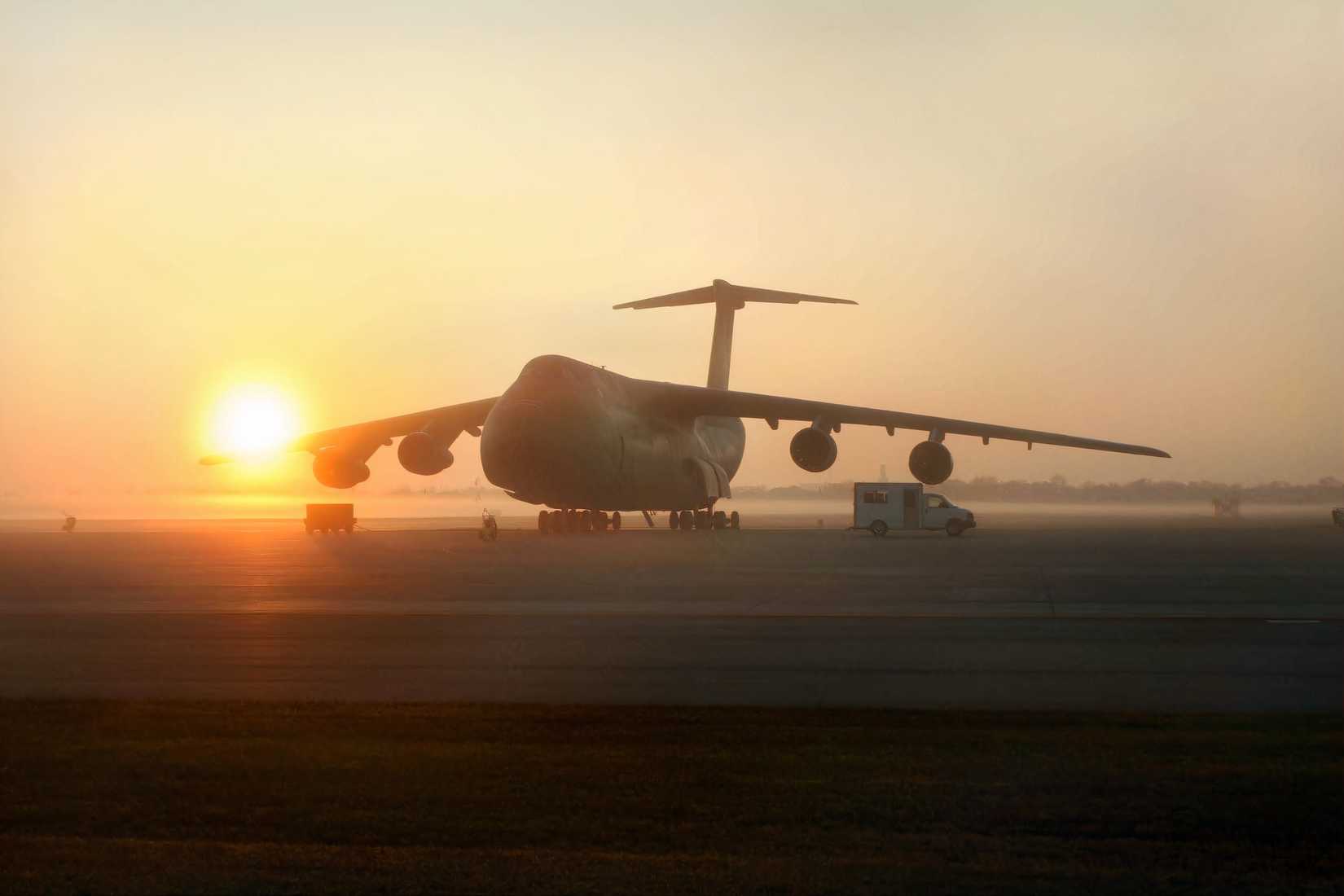 A photo of a C-5 Galaxy sitting on an apron. 