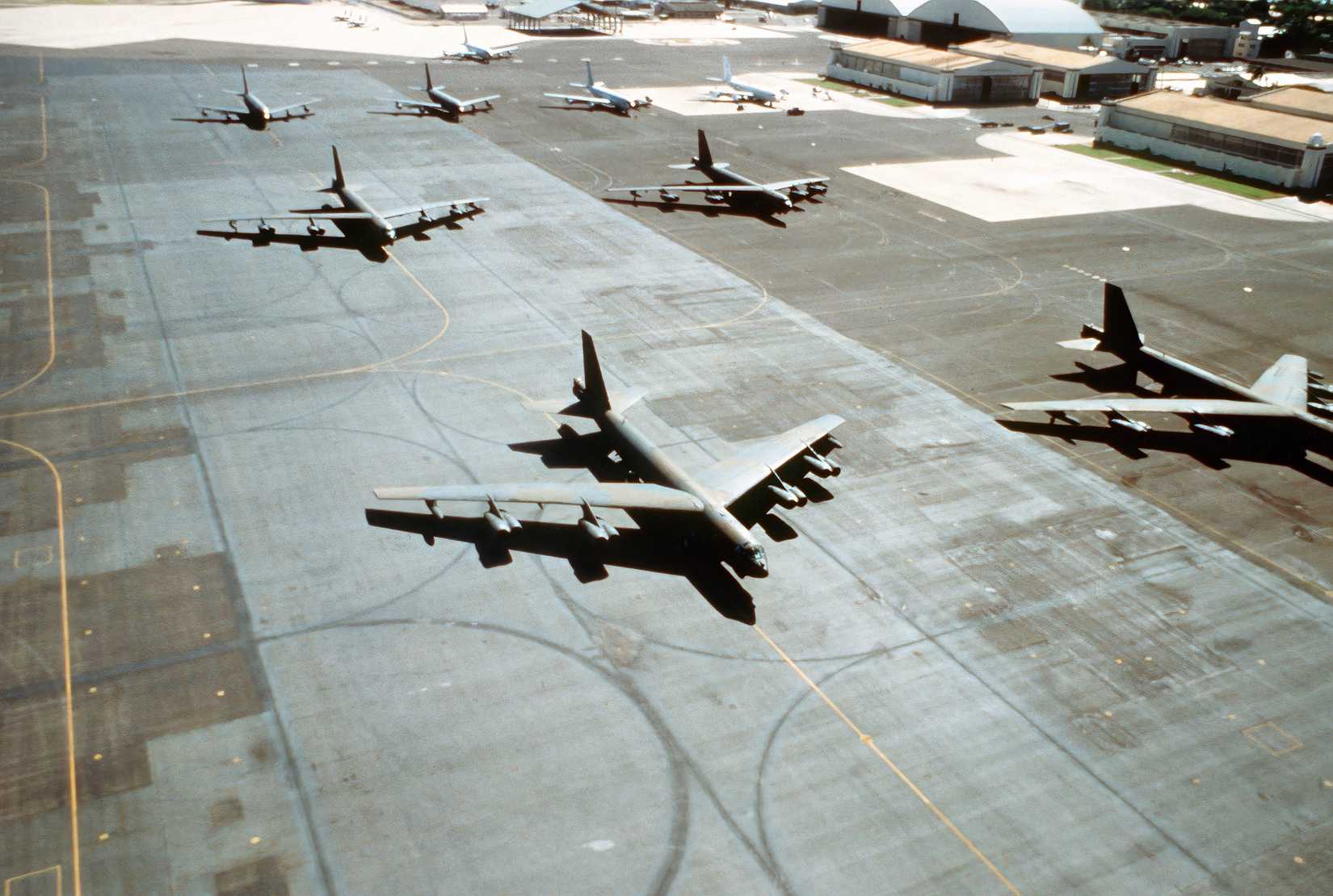 Photo of four B-52s sitting in an airship.