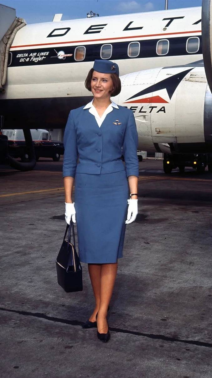 Delta Air Lines flight attendant 1950s outside aircraft