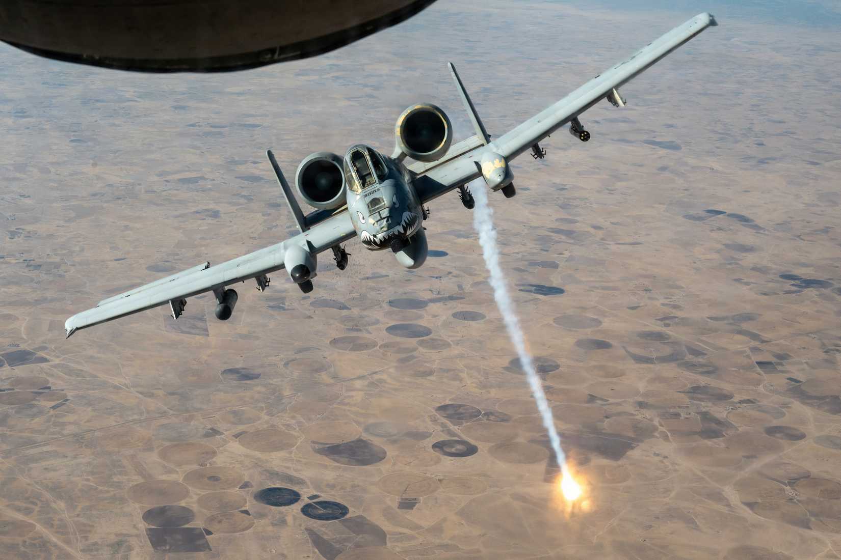 Air Force A-10 Thunderbolt II aircraft releases flares in the U.S. Central Command area of responsibility