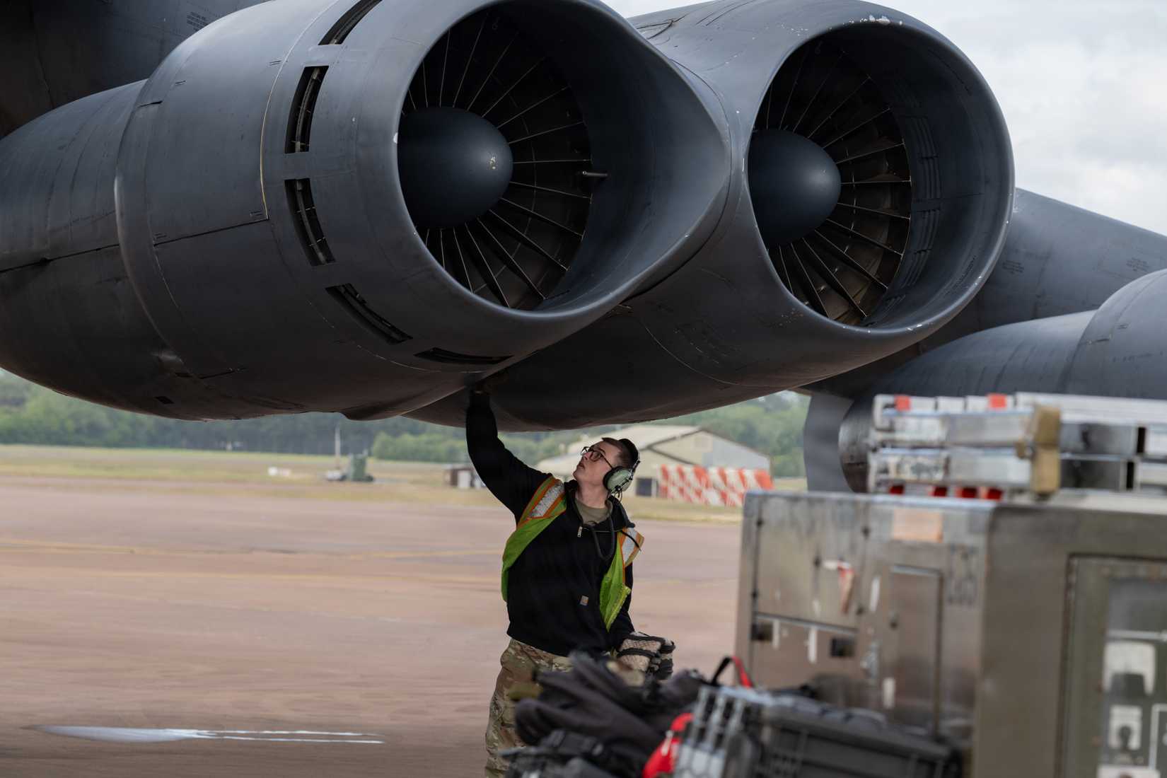 Air Force Airman disconnects an auxiliary power unit from a U.S. Air Force B-52H Stratofortress