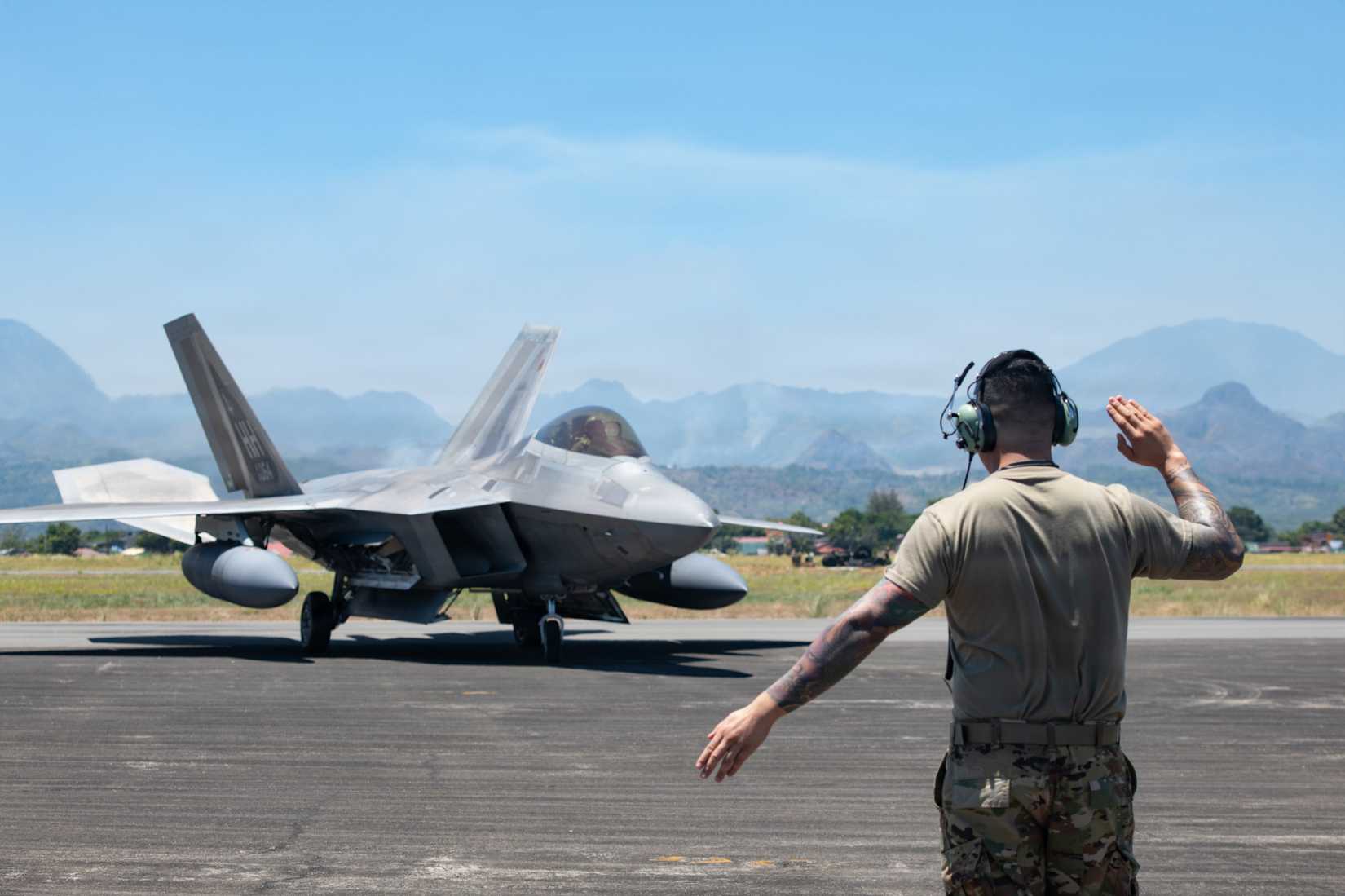 Air Force F-22 Raptor assigned to the 199th Air Expeditionary Squadron taxis after arriving for Exercise Cope Thunder 26-1 at Basa Air Base, Philippines