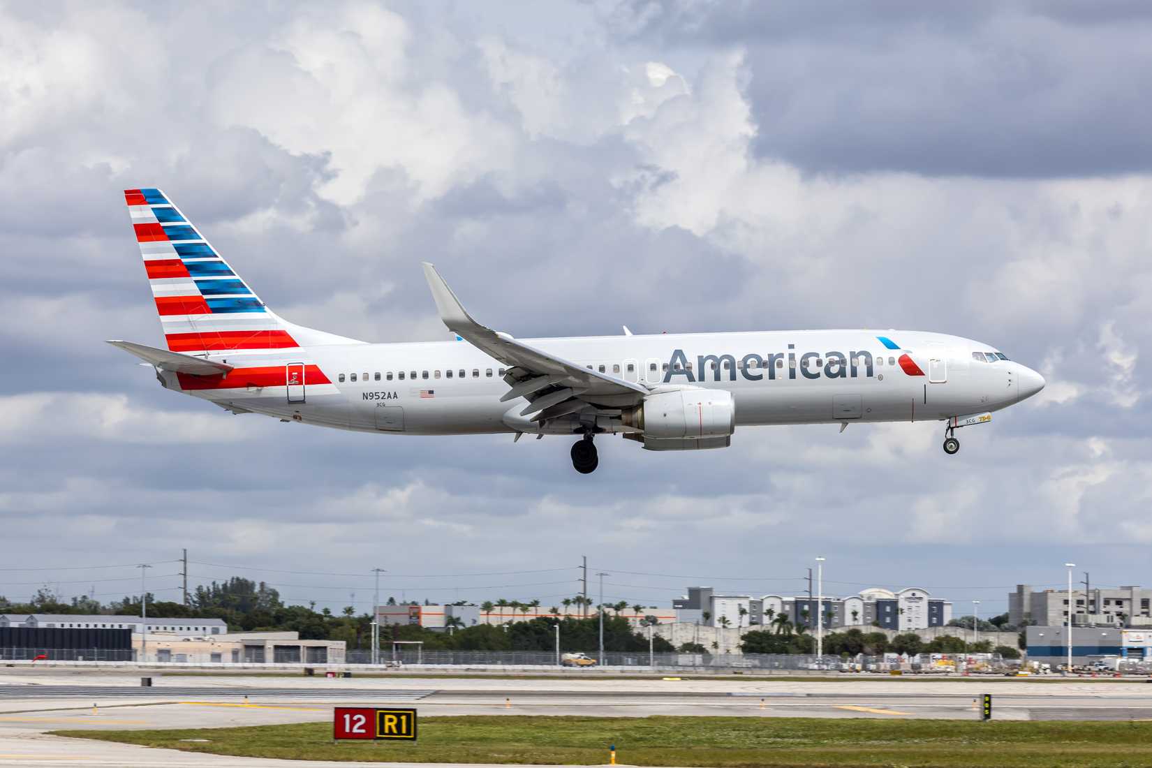 American Airlines Boeing 737-800 landing with blue sky