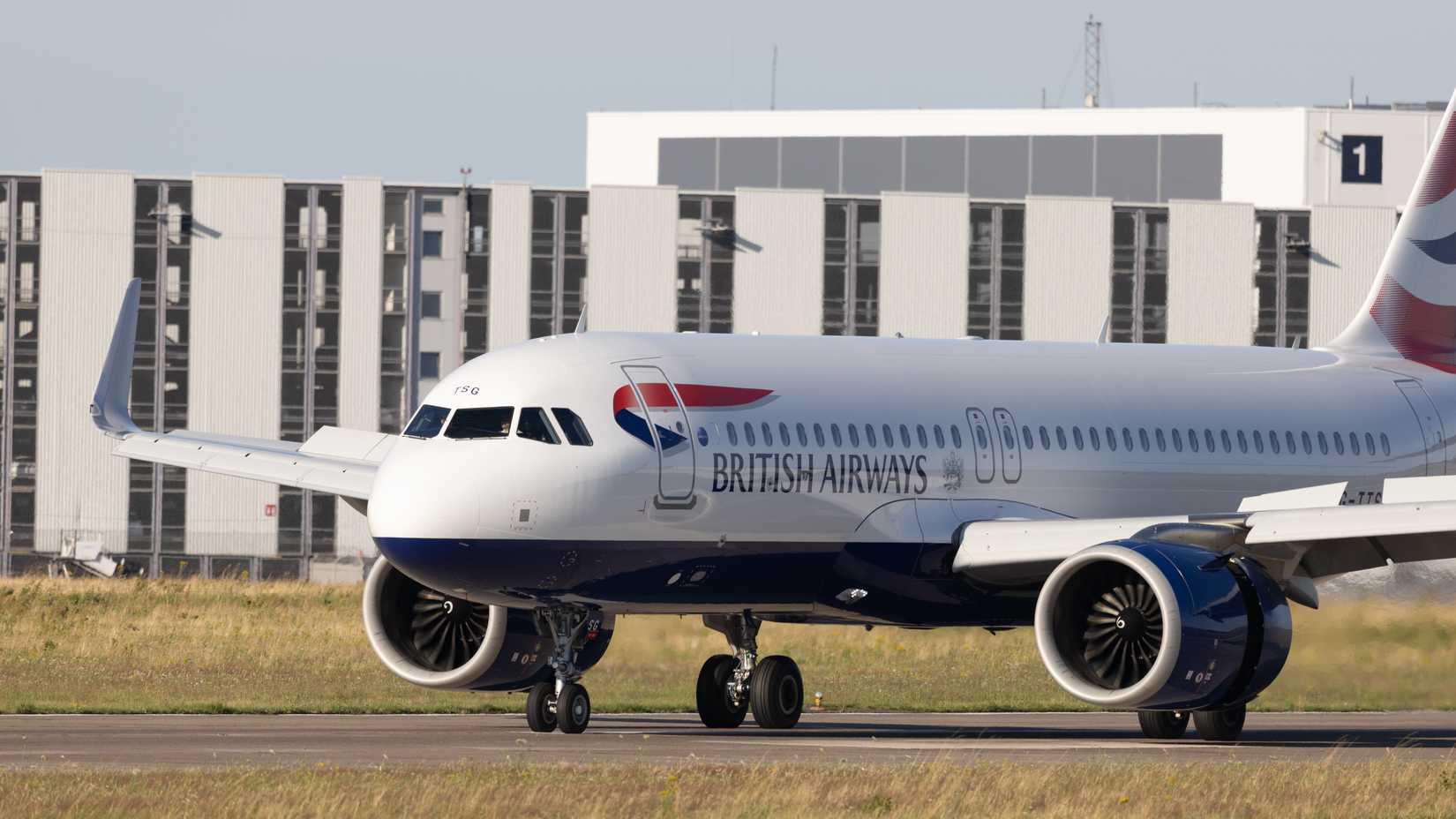 British Airways Airbus A320 taxiing at Hannover Airport in Germany.
