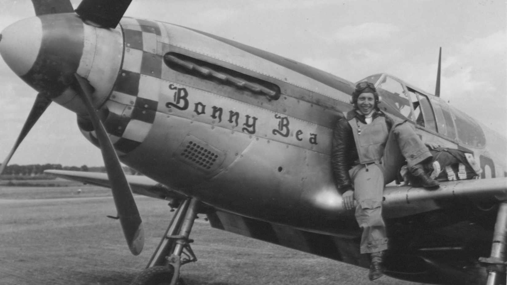 Capt. Eisenhart Sitting On The Wing Of His North American P-51 Mustang, The 'Bonny Bea'. England - 16 July 1944.