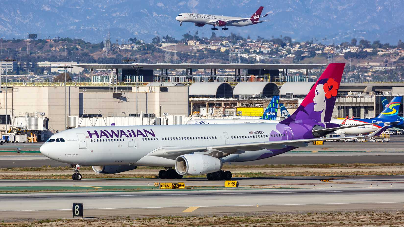 hawaiian airlines plane at lax with virgin atlantic plane in the background-1