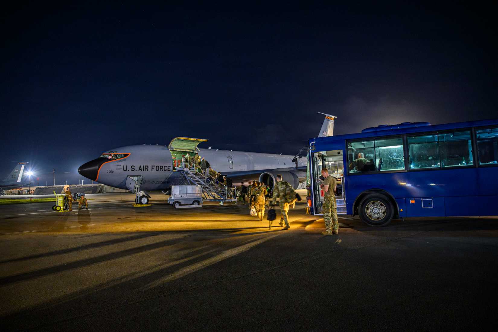 ir Force Airmen assigned to the 82nd Reconnaissance Squadron board a KC-135 Stratotanker at Kadena Air Base