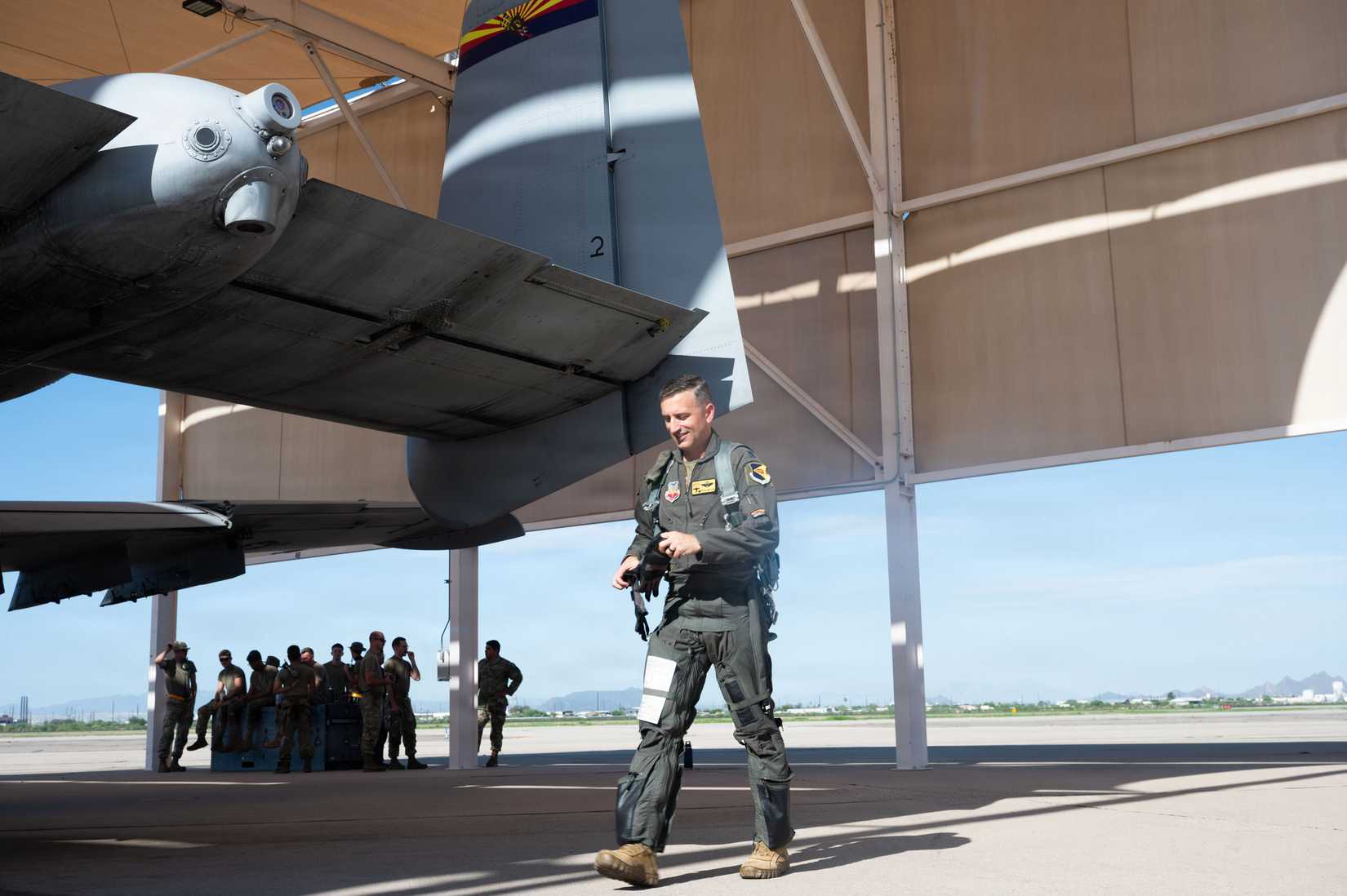 Lt. Col. Ryan Rutter, 357th Fighter Squadron commander, performs pre-flight checks on the A-10C Thunderbolt II before his final flight at Davis-Monthan