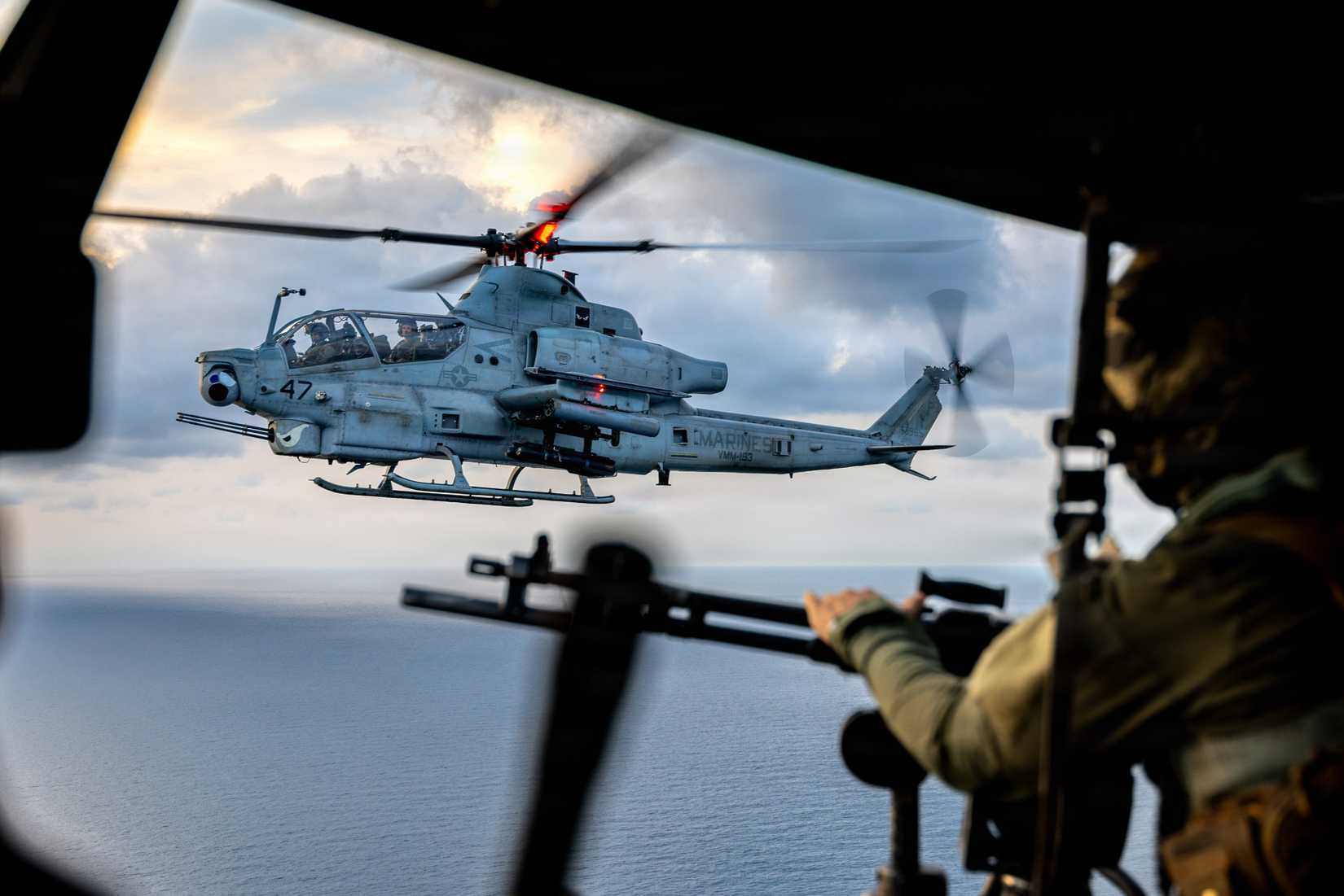 Marine Corps AH-1Z Viper assigned to Marine Medium Tiltrotor Squadron (VMM) 163 (Reinforced), 11th Marine Expeditionary Unit, conducts a fly-by