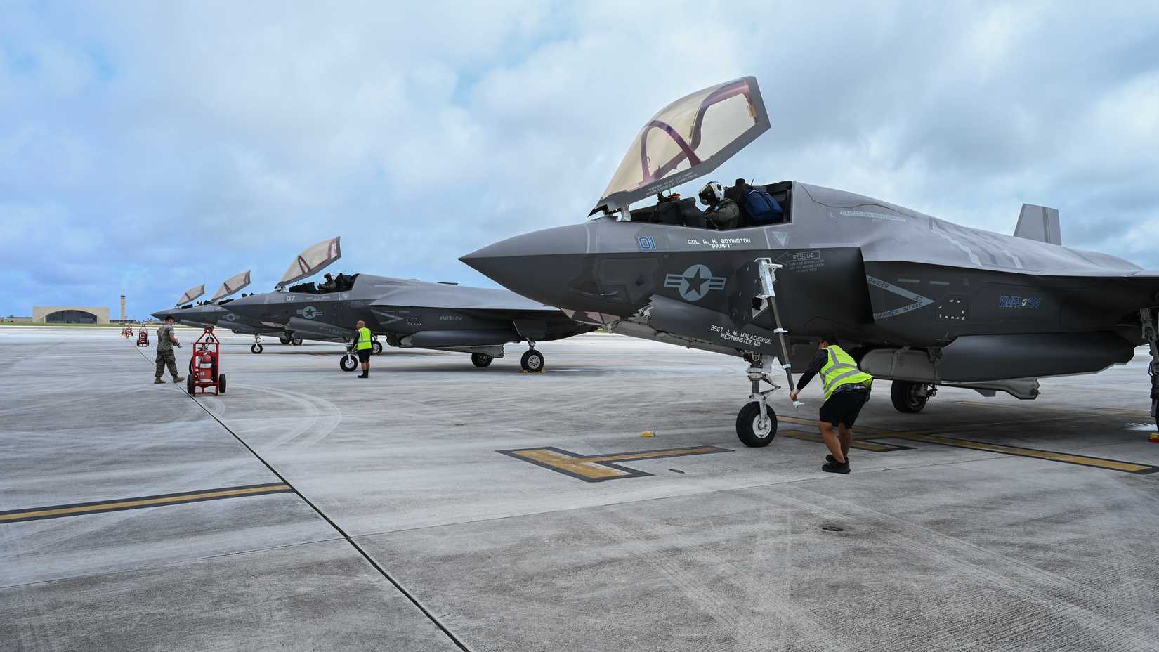 Marine Corps F-35B Lightning II parked in a row on the flightline at Andersen Air Force Base, Guam