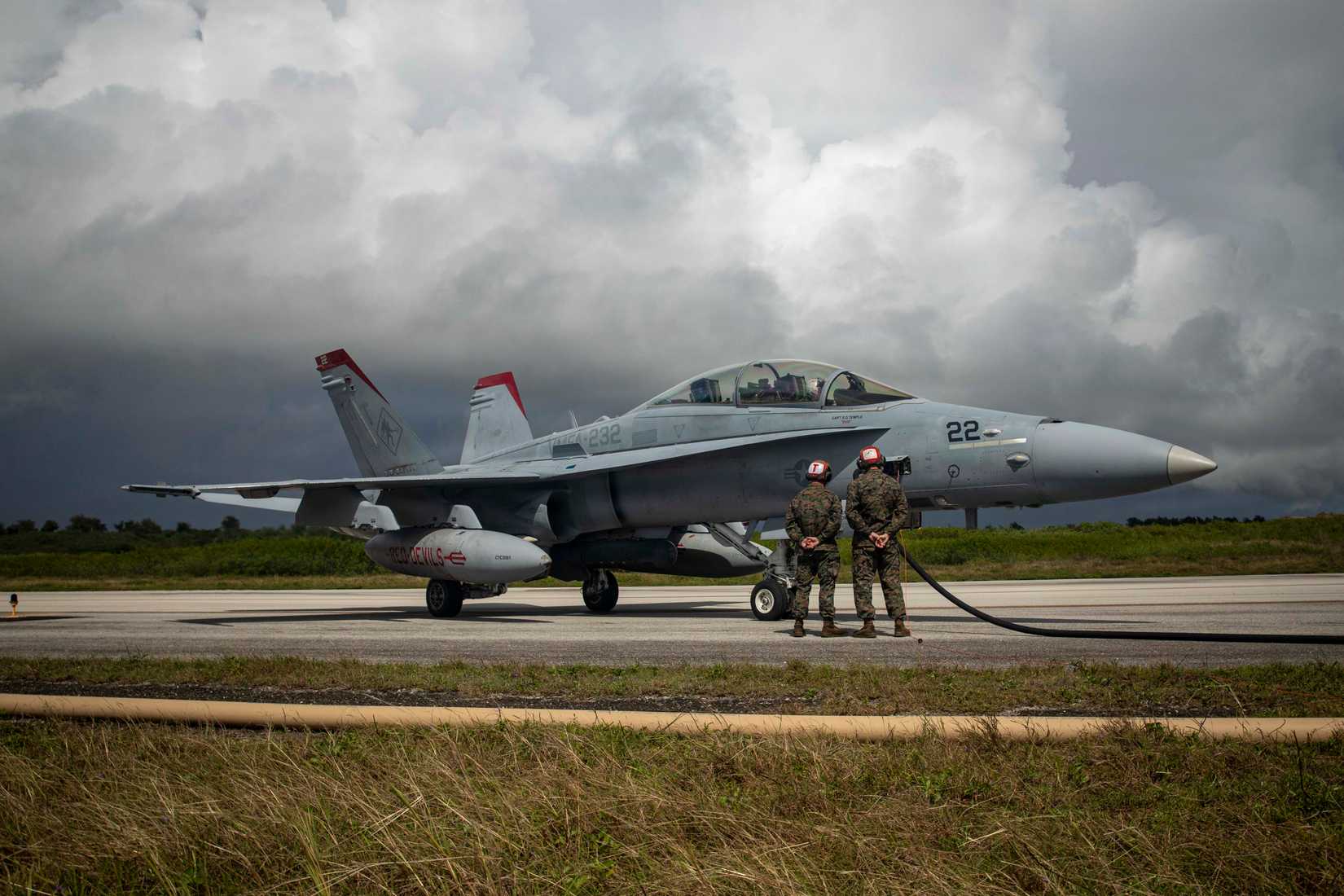 Marine Corps FA-18D Hornet is refueled during an Aviation Training Relocation program at Tinian
