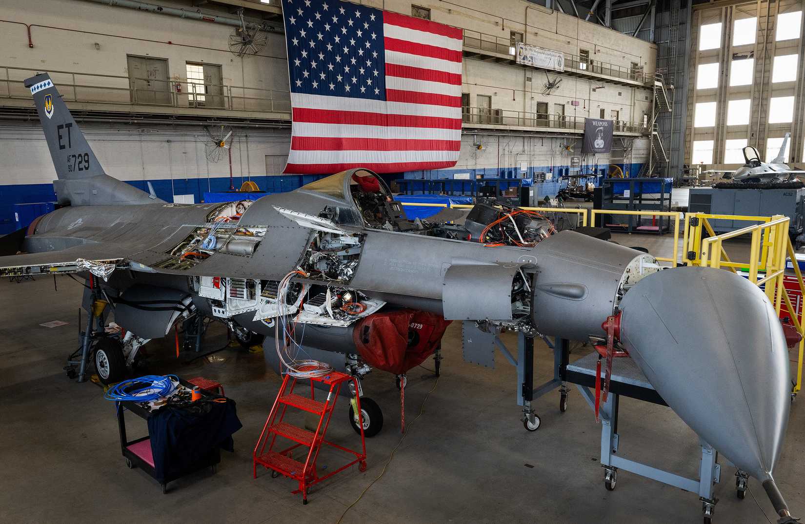 n F-16 Fighting Falcon undergoes modifications as part of the Viper Experimentation and Next-gen Operations Model