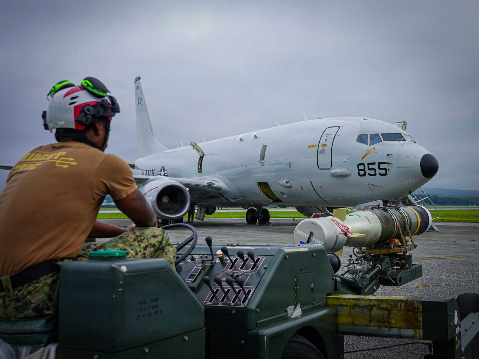 Navy Aviation Ordnanceman 3rd Class Jonathan Rivera, assigned to Patrol and Reconnaissance (VP) 26, prepares to load a Mark 54 lightweight torpedo