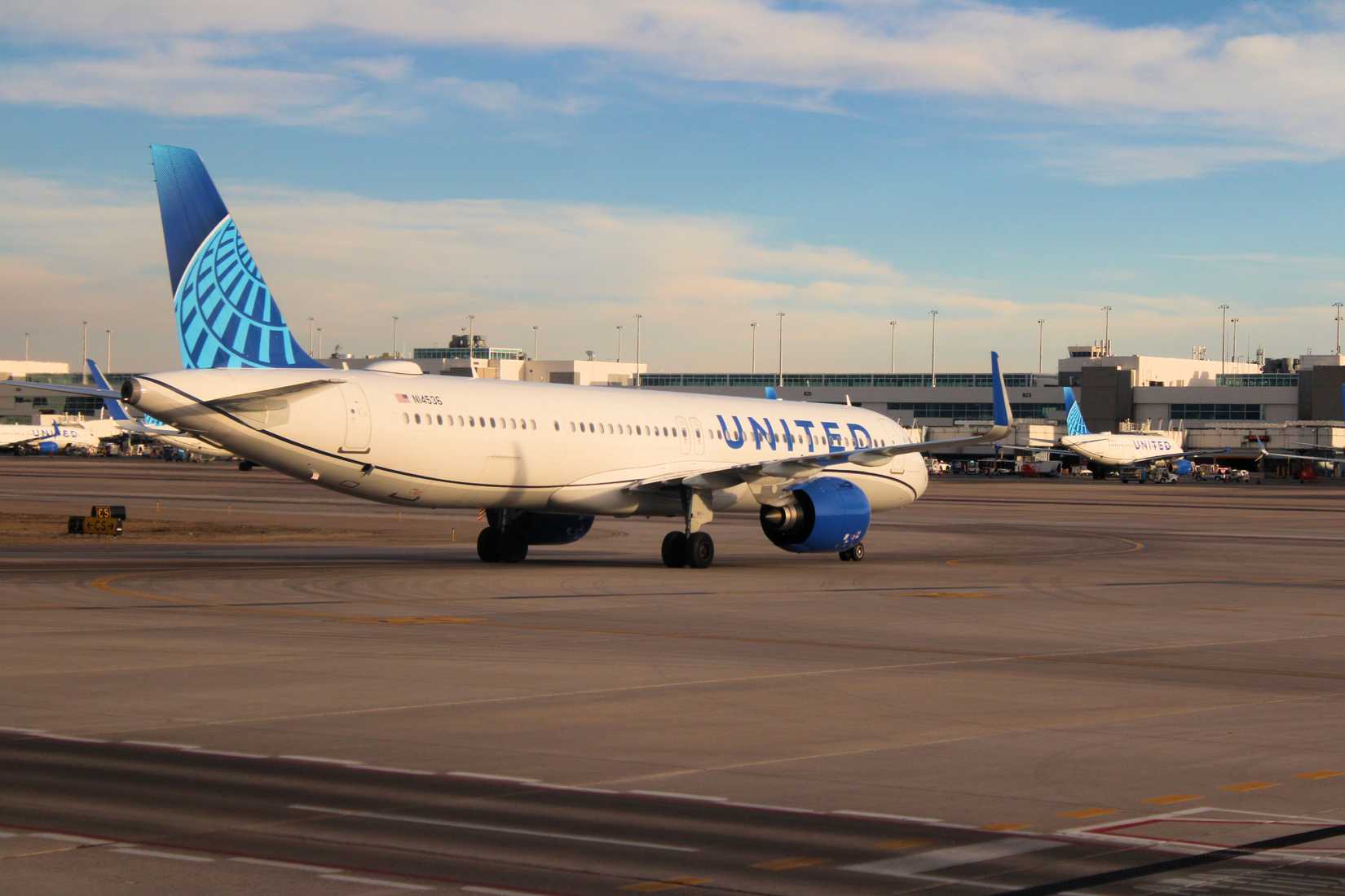 nited Airlines aircraft arriving to a gate taken at this hub airport taken in the Denver International Airport 