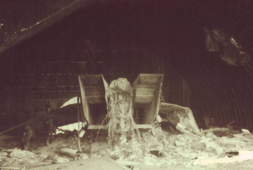 Post Operation Desert Storm assessment photograph of an Iraqi aircraft bunker with the remains of a MIG-25 Foxbat after being attacked with a 2,000 pound laser guided bomb