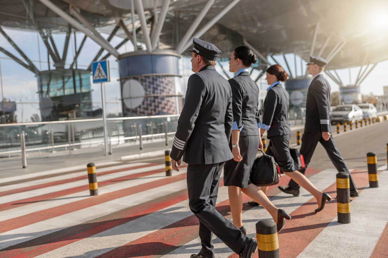 airline crew members walking