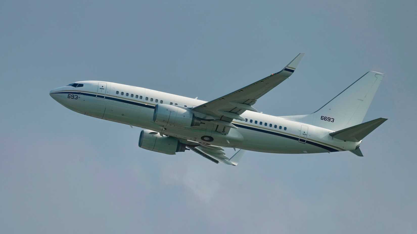 US Government Boeing 737-700 Climbing