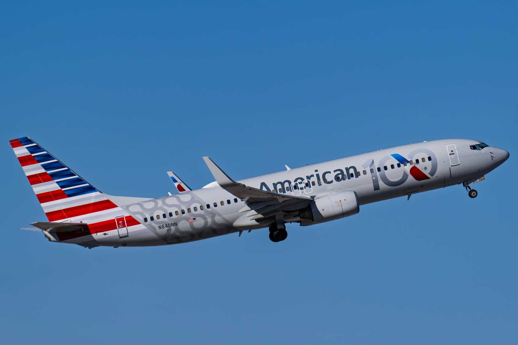 sky harbor airport 2-1-2026 Phoenix, AZ USA  American Airlines Boeing 737-800 N840NN 100 Years Liverydeparture from runway 7L at Phoenix Sky Harbor Intl. Airport.