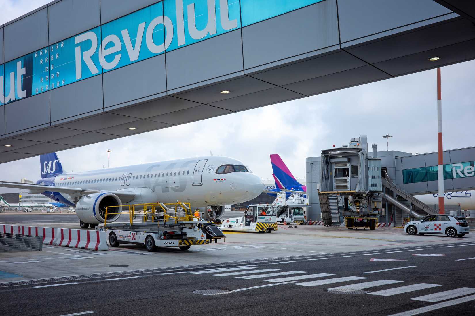 Revolut Advertisement On Walkway To A/C