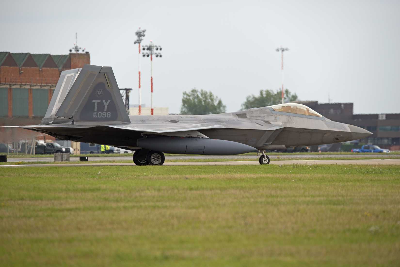 Lockheed Martin F-22A Raptor air superiority fighter call-sign Tabor 03 from Tyndall AFB, Florida prepares to take-off on return to the USA following deployment.