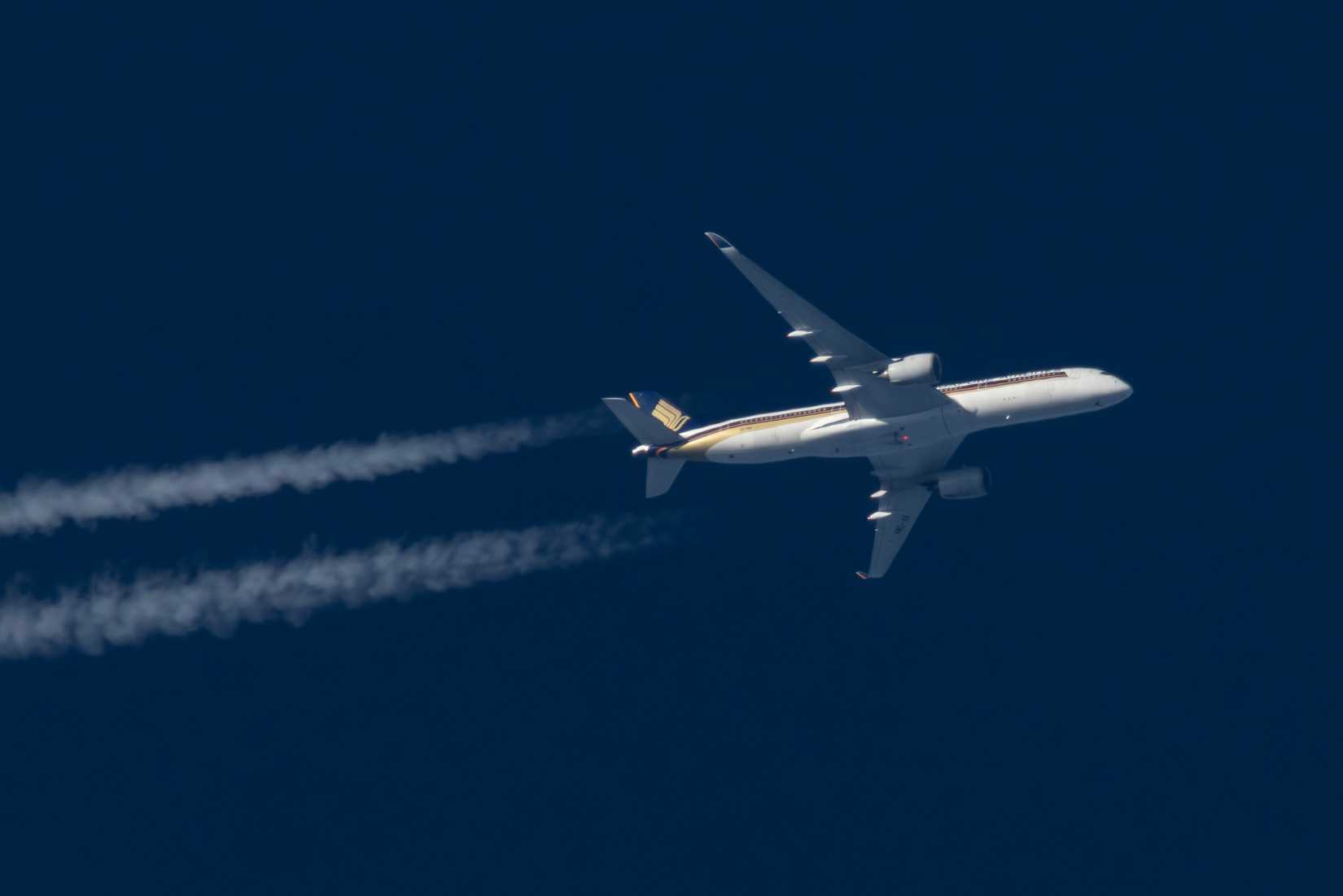 Singapore Airlines Airbus A350-900 passenger aircraft reg. 9V-SMA cruising high over Hungary.