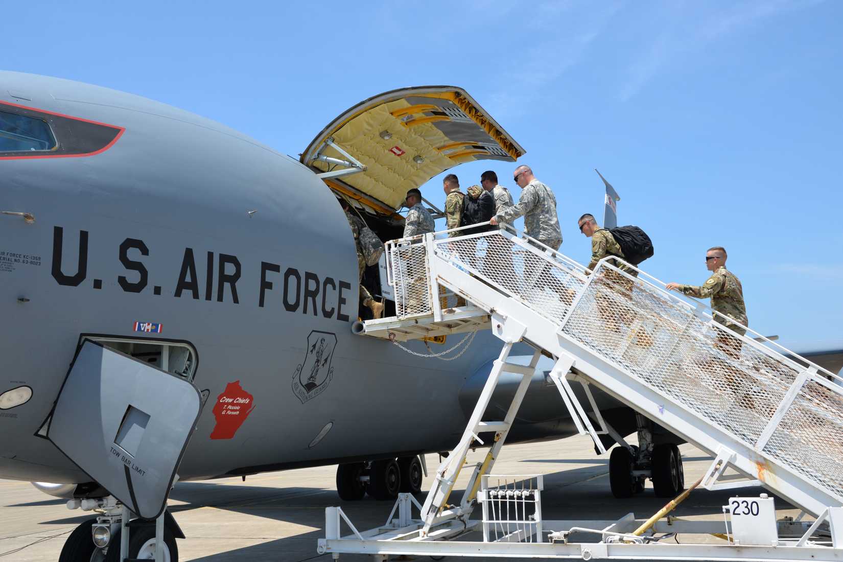 Soldiers and Airmen with the Indiana National Guard load a KC-135 Stratotanker aircraft with the 128th Wisconsin Air National Guard