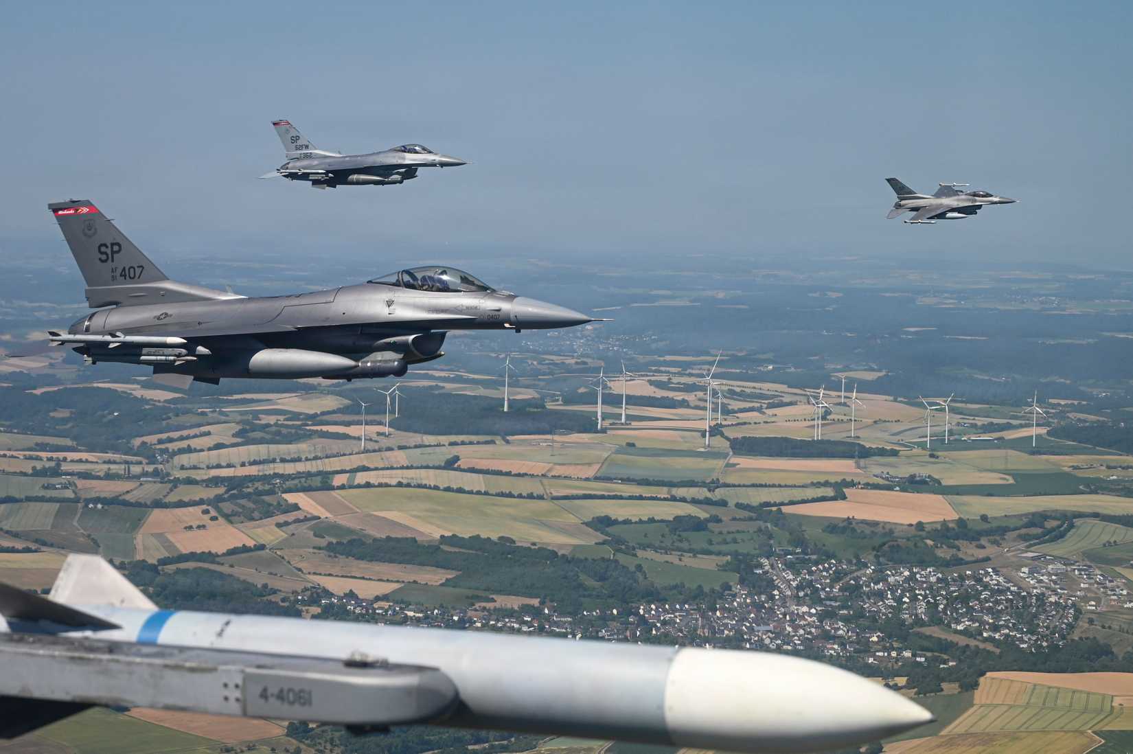 Three F-16 Fighting Falcon aircraft assigned to the 480th Fighter Squadron fly over Spangdahlem Air Base