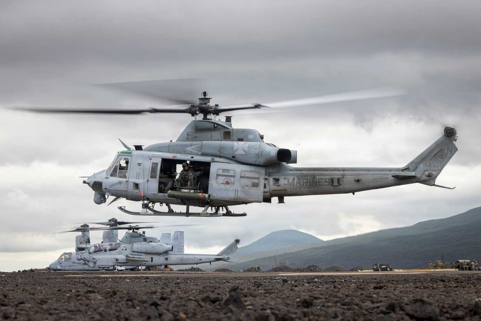 UH-1Y Venom helicopter attached to Marine Medium Tiltrotor Squadron (VMM) 164 (Reinforced), 15th Marine Expeditionary Unit, prepares to land